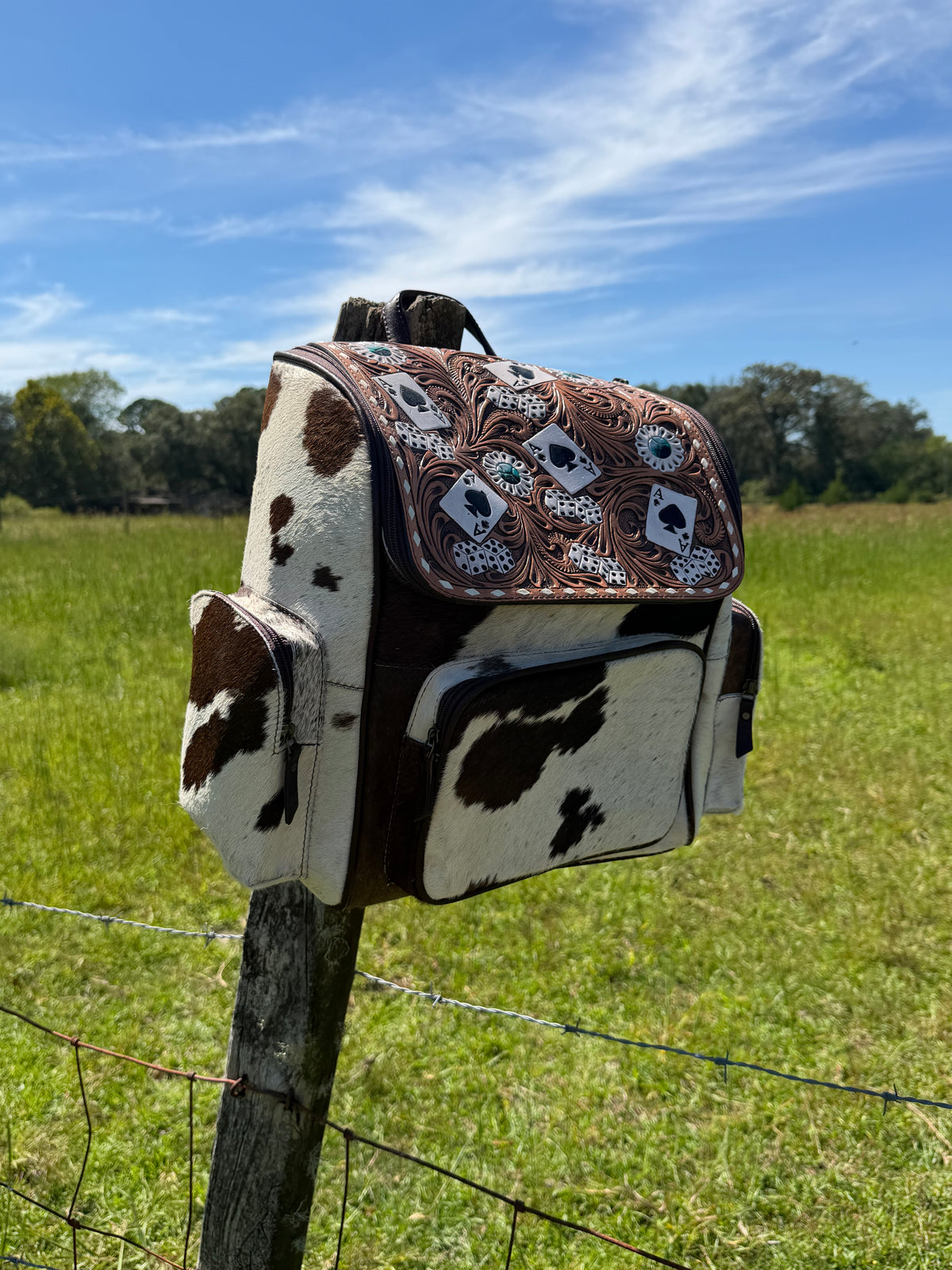 Tooled Leather Cards and Cowhide Backpack