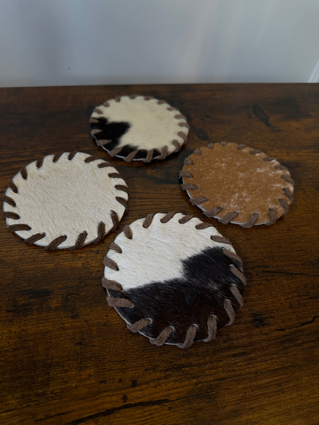 The Cowhide Coaster Set
