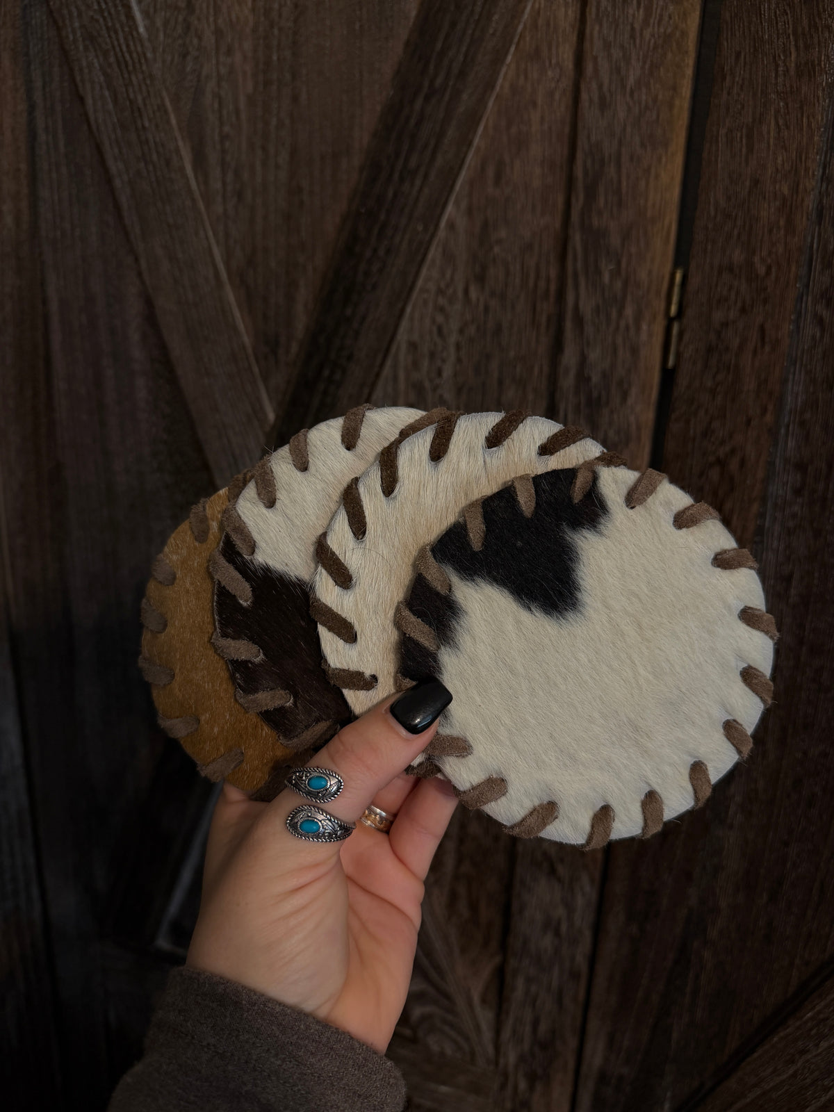 The Cowhide Coaster Set