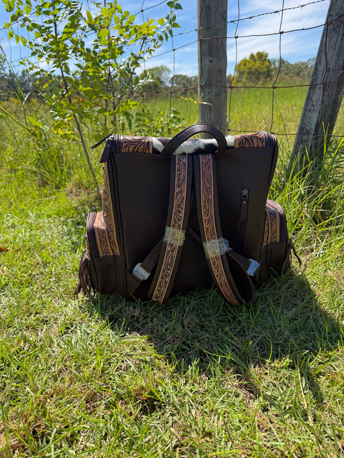 Tooled Leather and Cowhide Backpack With Fringe